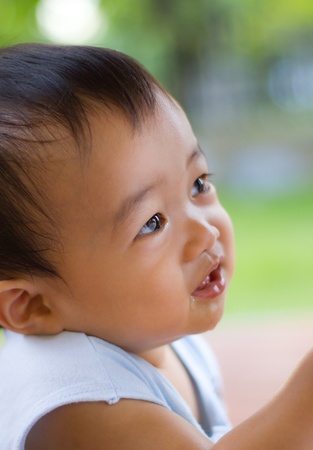 Happy asian baby boyの写真素材