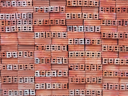 Close-up stack of orange bricks の写真素材
