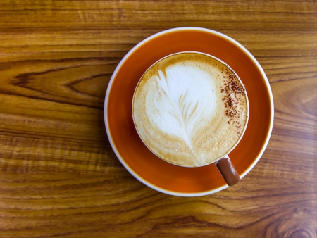 Coffee cup on the wooden tableの写真素材
