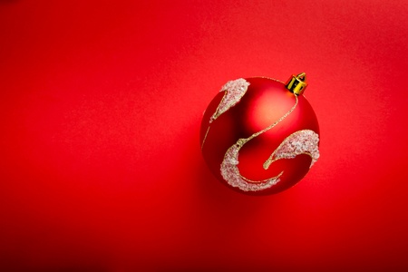 This is a closeup of red ball on red background. Free space for your text.の写真素材