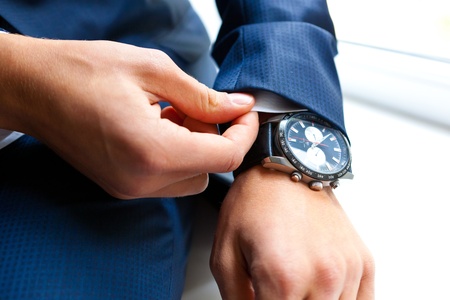 This is a closeup of businessman handsの写真素材