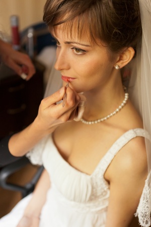 This is photograph of Bride getting make-upの写真素材