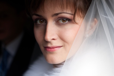 This is portrait of beautiful bride in carの写真素材