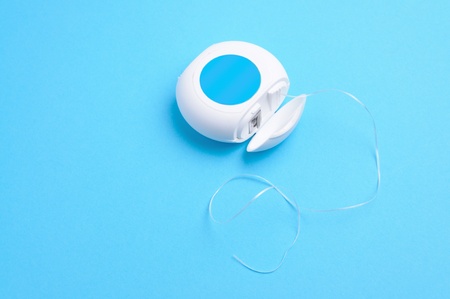 This is dental floss on blue background
