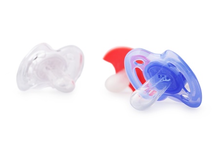 Different Baby dummies isolated over white