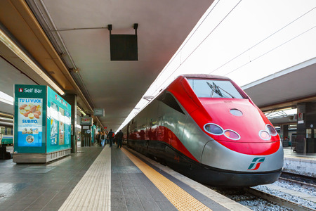 NAPLES, ITALY - NOVEMBER 30, 2014: Napoli Centrale railway station. Freccia Rossa bullet train 300 km/h.のeditorial素材