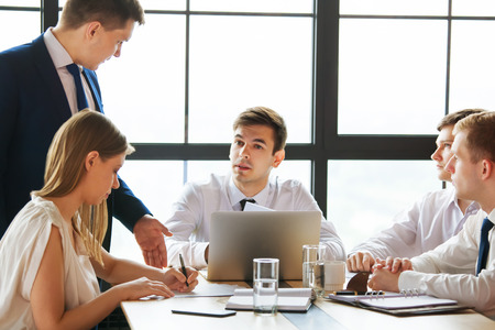 Group of young business team working at a tableの写真素材