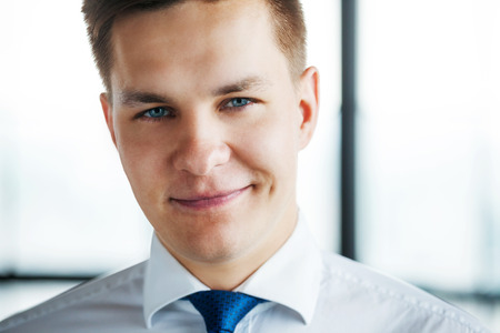 Portrait of confident young business man looking at camera.の写真素材