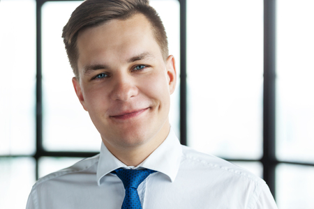 Portrait of confident young business man looking at camera.の写真素材