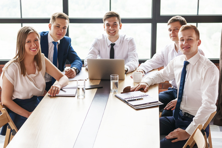 Group of young business people looking at camera.の写真素材