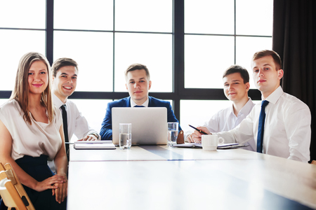 Group of young business people looking at camera.の写真素材