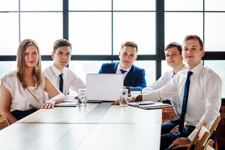 Group of young business people looking at camera.の写真素材