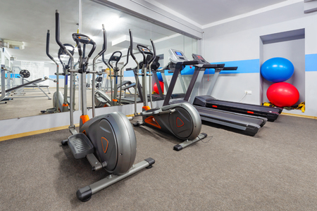 Cardio zone in modern gym. Ellipticals and treadmills.の写真素材