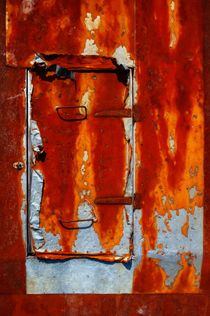 Old rough rusted metal plate close up.の写真素材