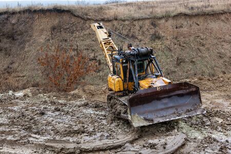 Chain Tracked Bulldozer on mud road.の写真素材