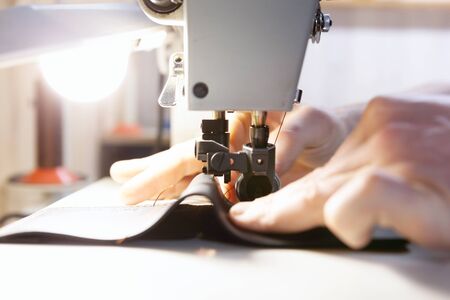Close up of professional sewing machine for leather work.の写真素材