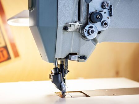 Close up of professional sewing machine for leather work.の写真素材