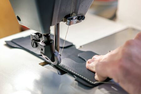 Close up of professional sewing machine for leather work.の写真素材
