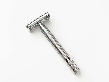 Studio shot of Double-edge safety razor isolated on white background.の写真素材