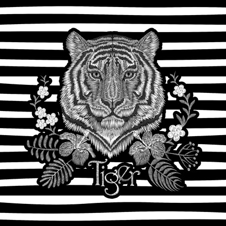 White embroidery realistic texture tiger face patch. Fashion floral print textile decoration design with inscription vector illustration striped backgroundのイラスト素材