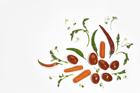 Healthy diet fresh vegetables flat lay isolated on white. Tomato, bell-pepper, cucumber, ruccola,...