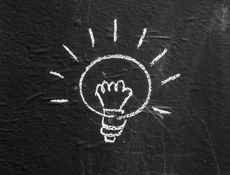 Halogen bulbs are written on the background black boards.