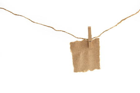 close up of a notes and a clothes pegs on white backgroundの写真素材