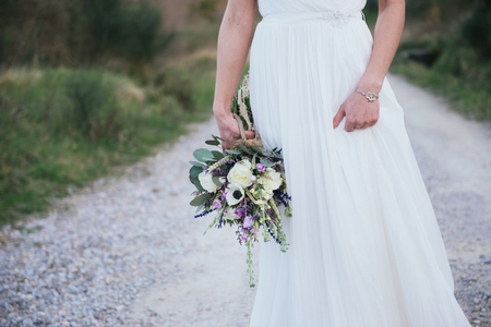 details of rustic and hippie bouquet with lavender and white flowersの写真素材
