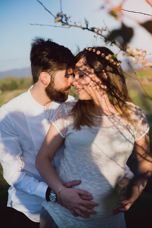 human pregnancy, smiling pregnant woman, couple,の写真素材