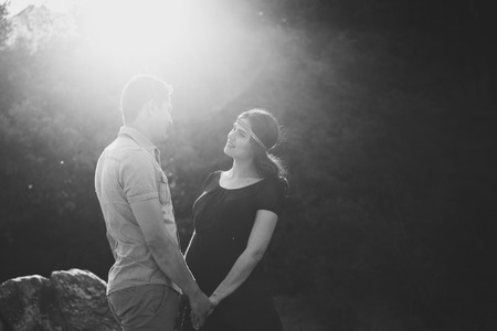 engaged couple who are expecting a babyの写真素材