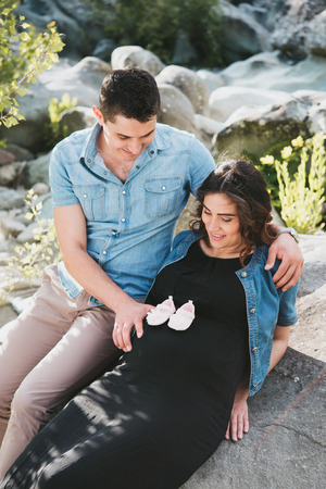 couple expecting a baby, outsideの写真素材