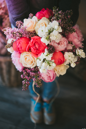 details of bouquet hold by womanの写真素材