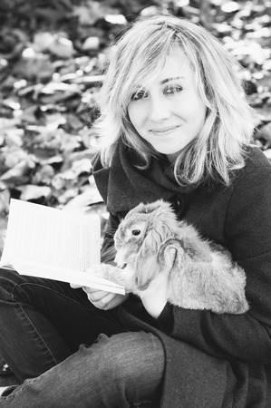 portrait of a woman with rubbitの写真素材