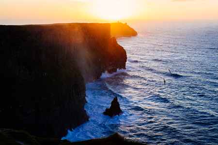 ireland, cliffs at sunsetの写真素材