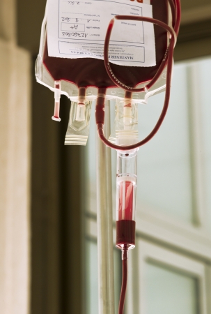 Bag, hanged from a perch, with type A positive blood for a transfusion. のeditorial素材