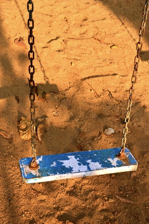 A single swing at a playground in Kerala, Indiaの写真素材