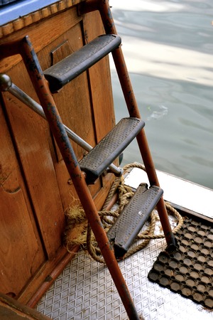 Ladder steps on a boat in the Indian Ocean off the coast of Kerala, Indiaの写真素材