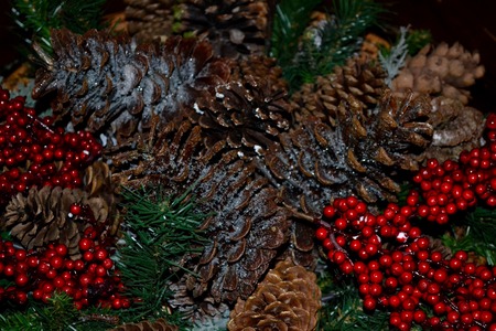 These festive pine cone centerpieces at a Winter Wedding set the Christmas esthetic.の写真素材