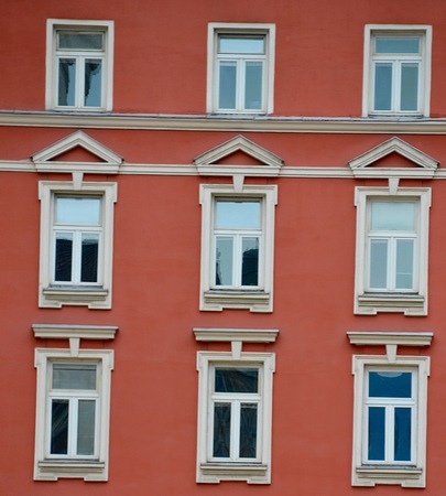 The white windows stand out against the vivid exterior of this home in Sofia, Bulgaria