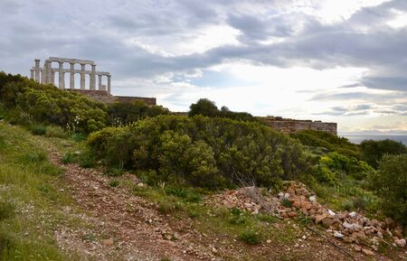 The Temple of Poseidon overlooking Cape Sounion and the Aegean Sea in Greeceの写真素材