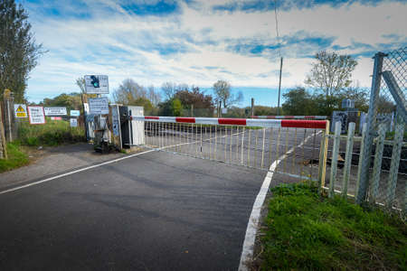 Railroad crossing on country road near Canterbury, Kent, England.