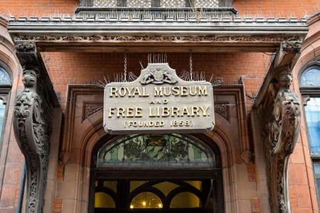 Wooden sign at entry to Canterbury Royal Museum and Free Library in Canterbury, Kent, England.のeditorial素材