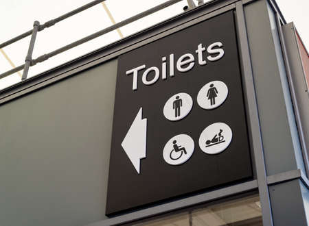 Black and white toilets sign with men, ladies, disabled and baby changing icons.の写真素材