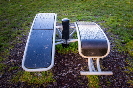 Close up of outdoor gym exercise sport equipment at public park. Weights and resistance training.の写真素材