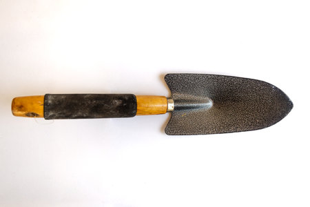 Shovel or trowel, gardening hand tool equipment, isolated on white background. Close up, top view.