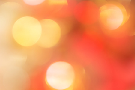 Orange and red bokeh. The background with boke. Abstract texture. Color circlesの写真素材