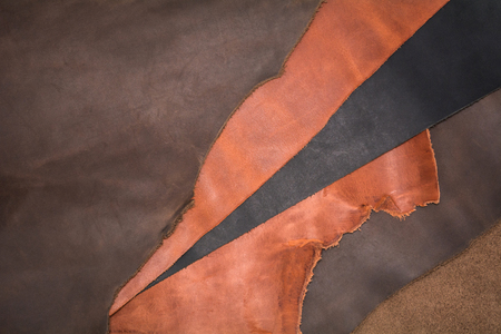 Texture of pieces brown leather. Natural material background