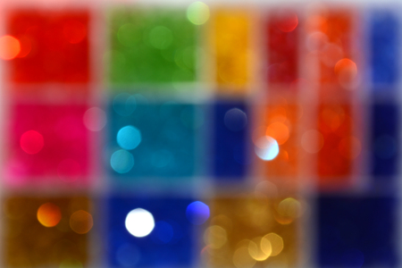 Abstract texture with multicolored bokeh. Colored squares. Blurring background.の写真素材