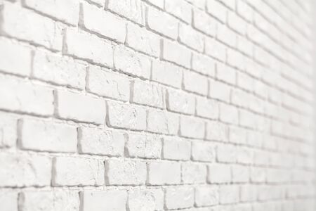 Photo of a white brick wall. Abstract background.