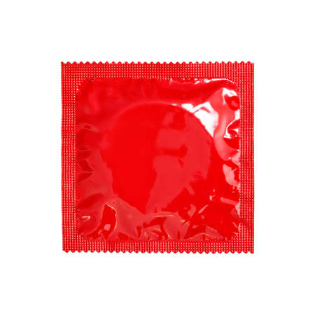Condom in red package isolated on white backgroundの写真素材